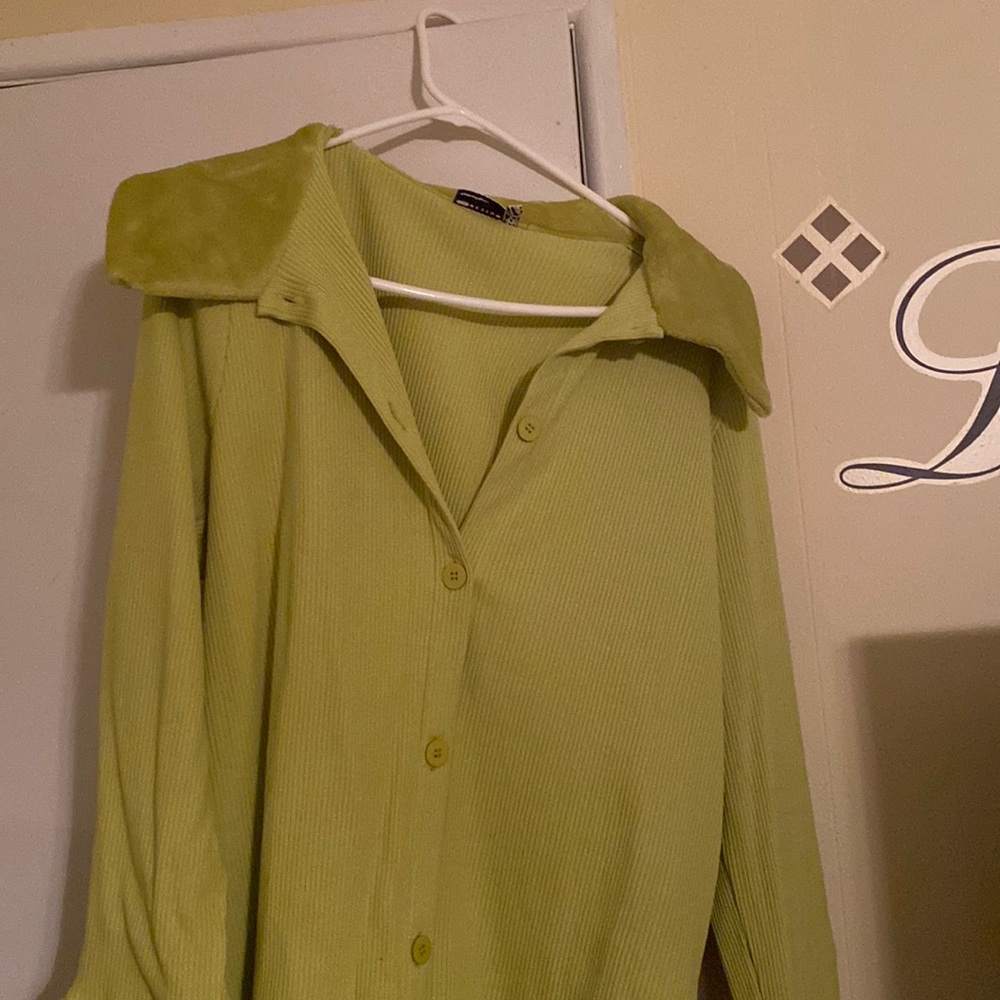 Green button up top with fluffy collar and sleeves